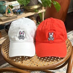 Lot of 2 Psycho Bunny caps.
